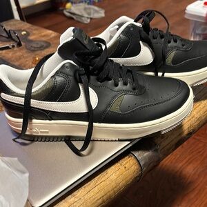 Nike Black and White Sneakers with Retro Design and Chunky Sole